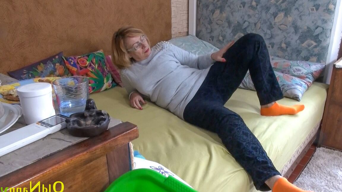 21P Wild granny Jitka strips her clothes off and fucks her muff with an orange toy