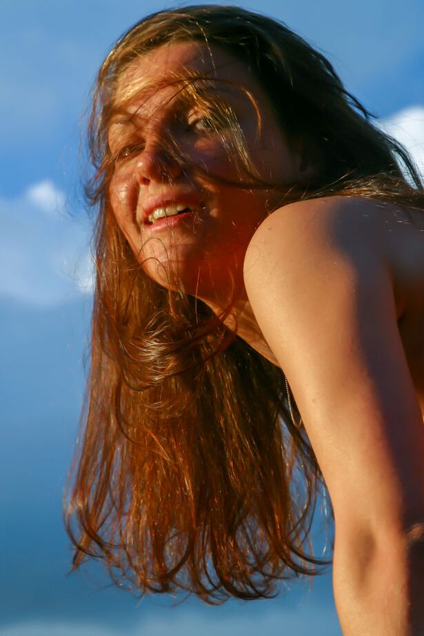 16P 18-year-old girl Kristina models totally naked on a lakeside dock