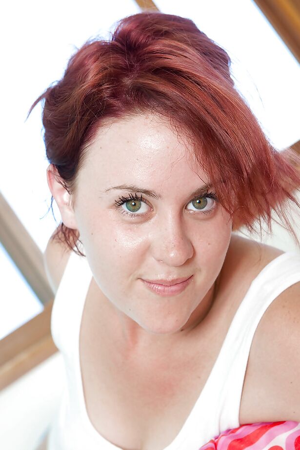 16P Chubby redhead Tinsley models her sexy feet and toes before getting naked