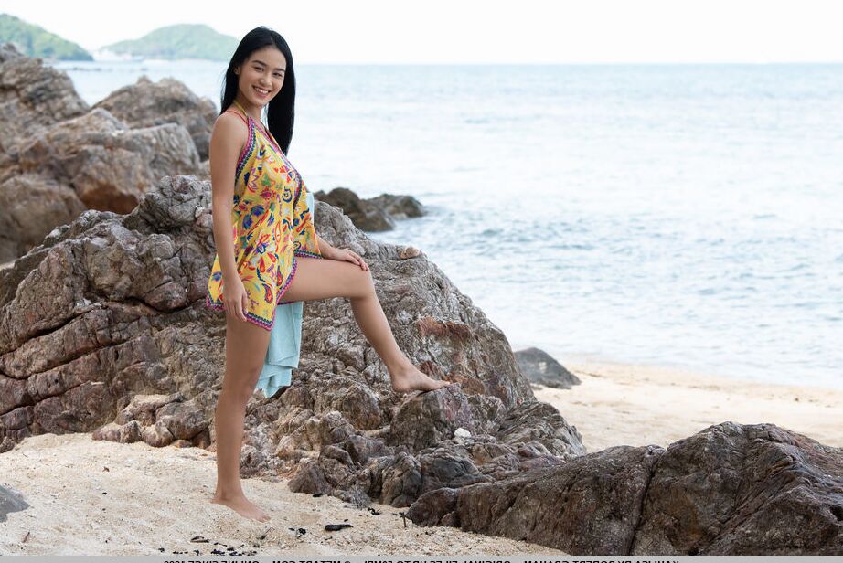 18P Dark haired teen Kahlisa strikes confident nude poses in and out of the ocean