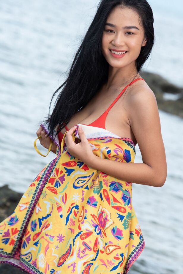 18P Dark haired teen Kahlisa strikes confident nude poses in and out of the ocean