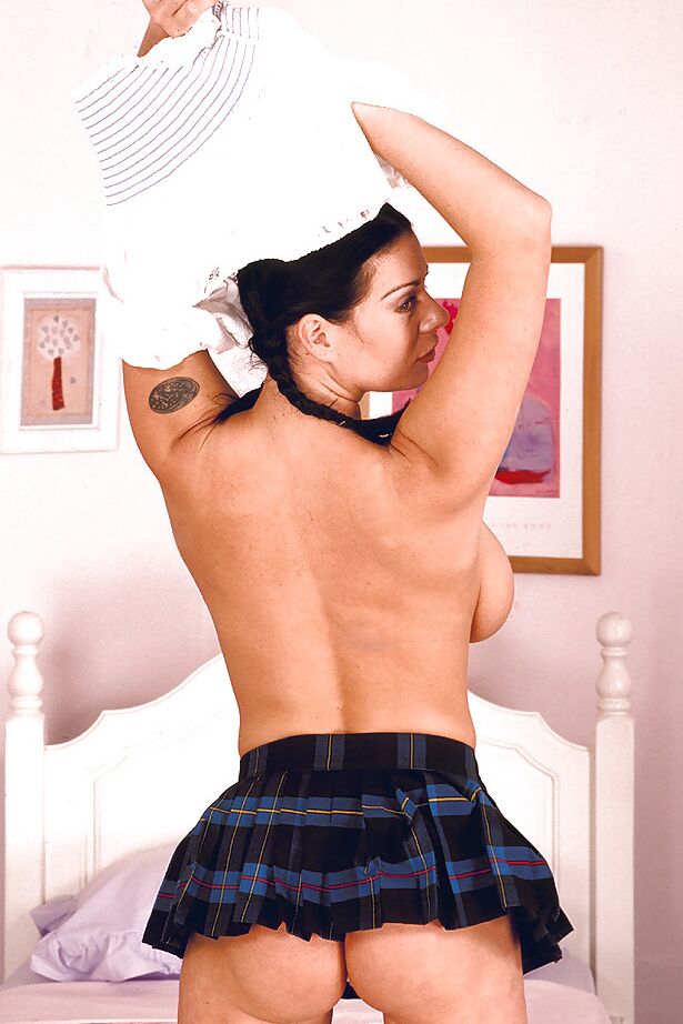 16P European solo girl Linsey Dawn McKenzie unveiling massive boobs in pigtails