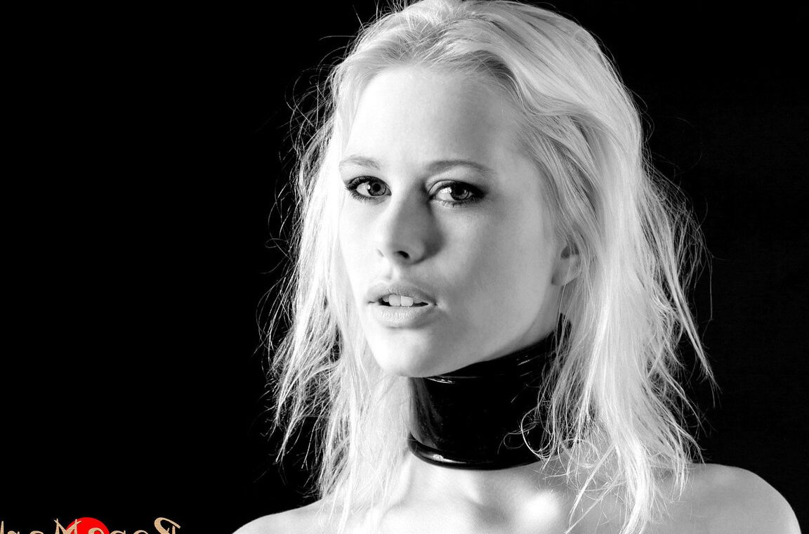 16P Blonde submissive is bound with rope before being suspended in the air