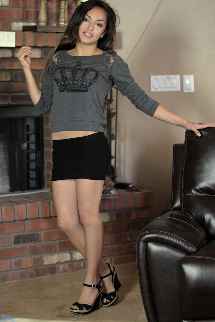 15P Beautiful young Cande Chavez exposes her tiny tits while toying her bald pussy