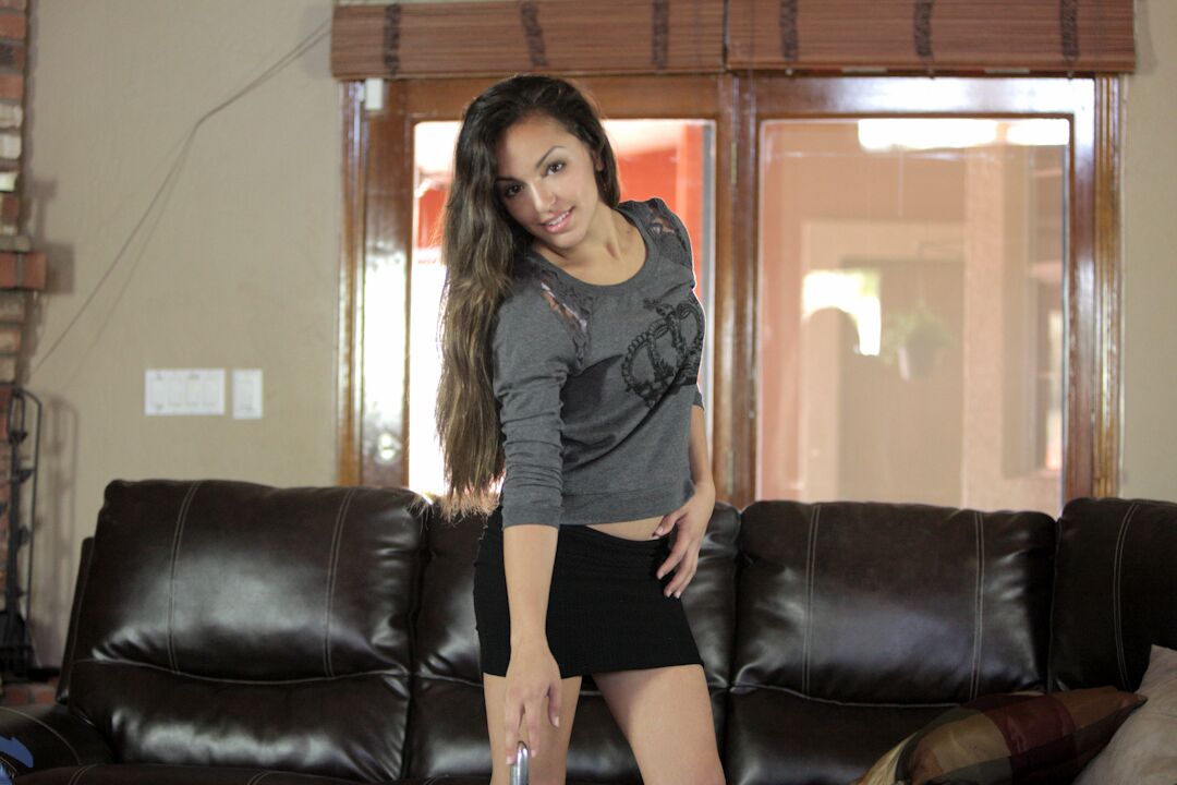 15P Beautiful young Cande Chavez exposes her tiny tits while toying her bald pussy