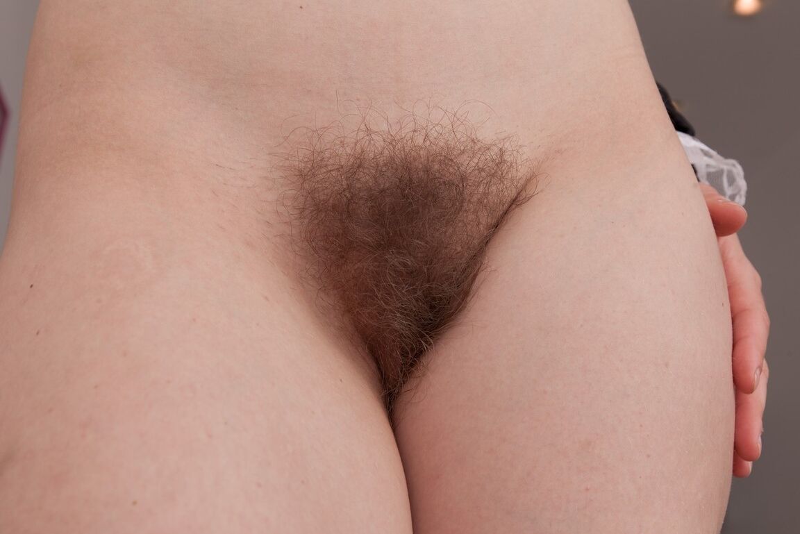 16P House maid Baibira spreads her hairy bush while lying on the kitchen table