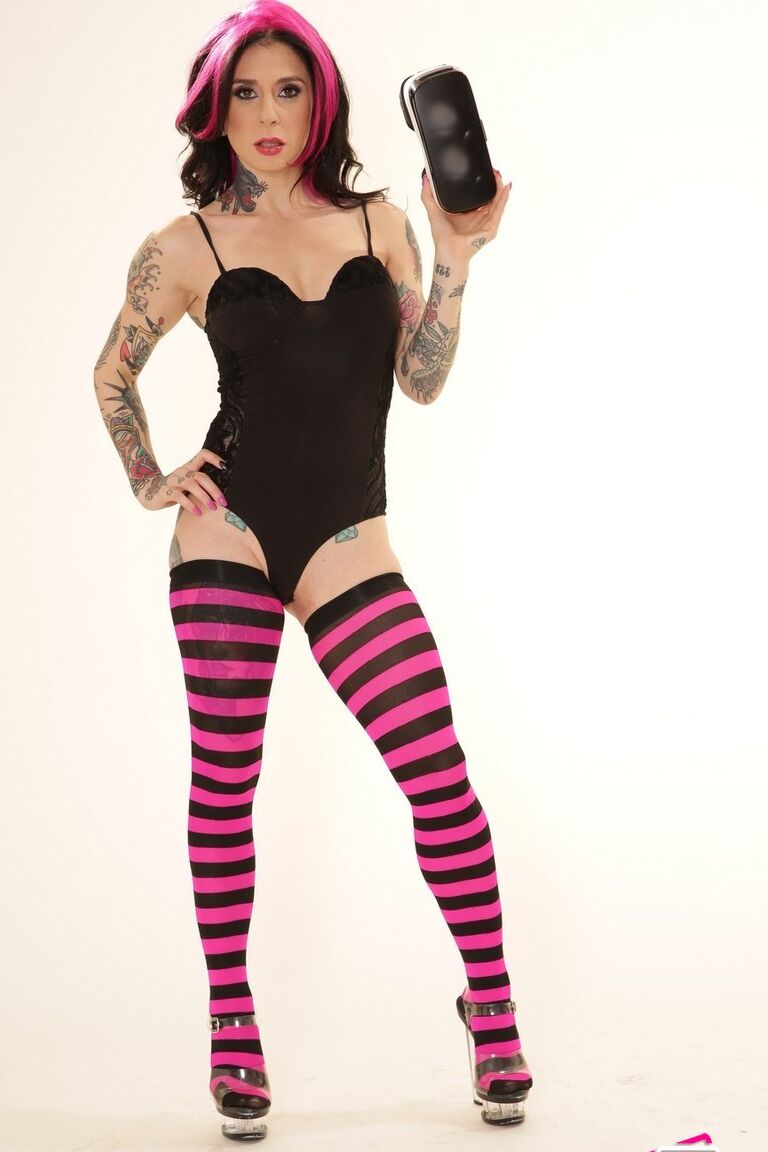 21P Inked wife in a bodysuit Joanna Angel poses with a VR set in her hands