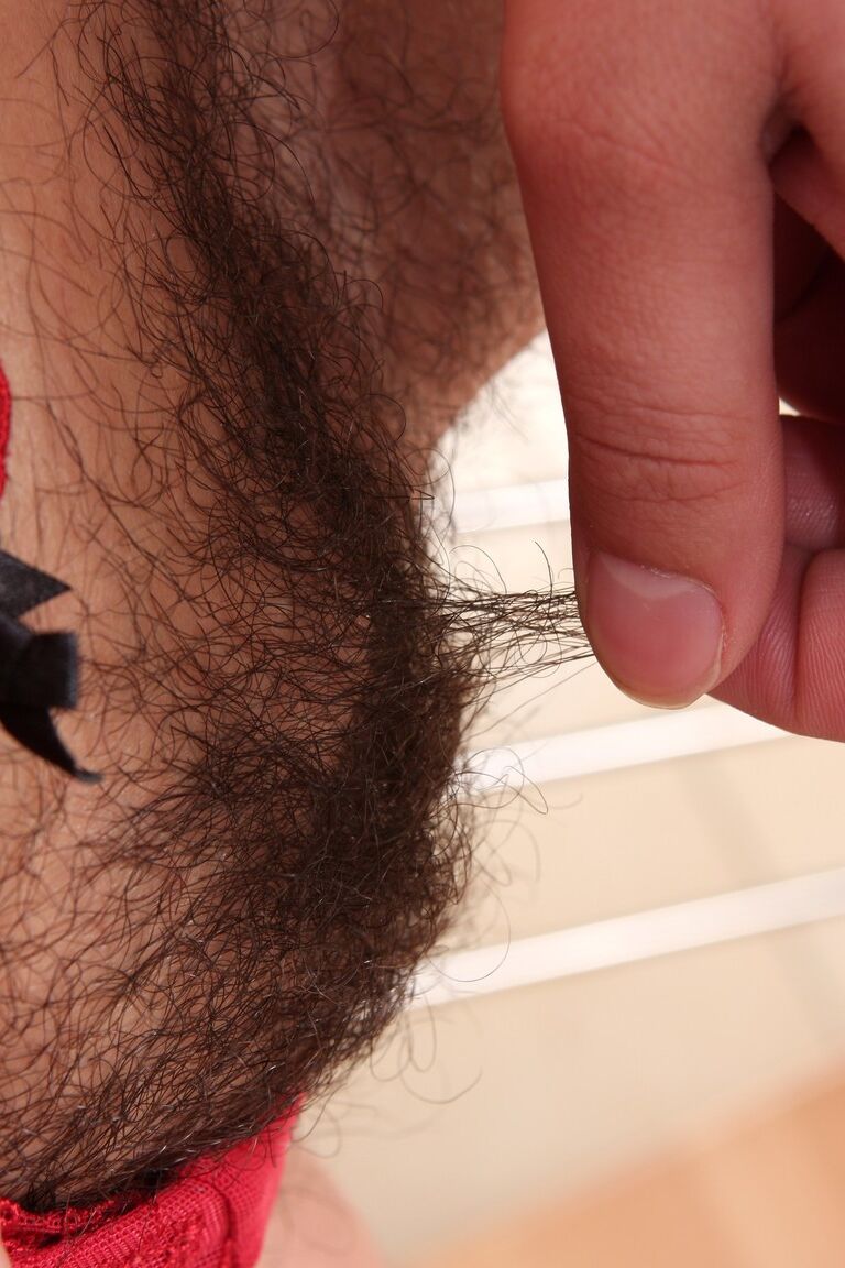 17P Redhead with natural tits Ansie shows her hairy twat and ass in a closeup
