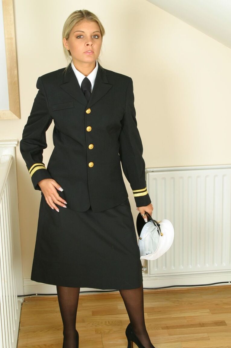 21P Seductress Naomi K removing hot uniform and teasing in provocative lingerie