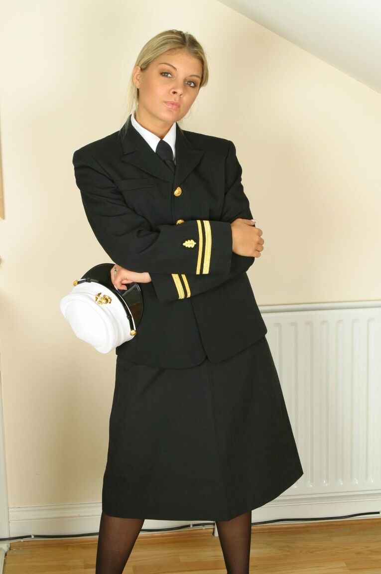 21P Seductress Naomi K removing hot uniform and teasing in provocative lingerie
