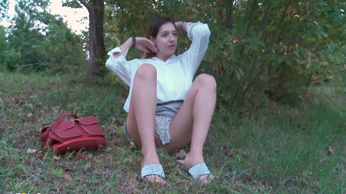 15P Brunette cutie squats to piss near the lake