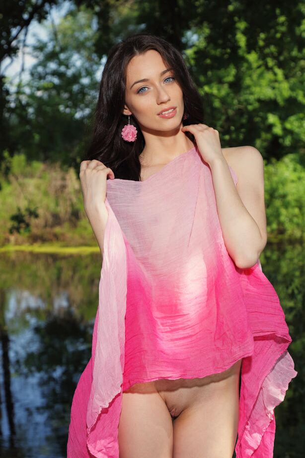 18P Dark haired Zsanett Tormay flashes upskirt and bares tiny tits in the woods