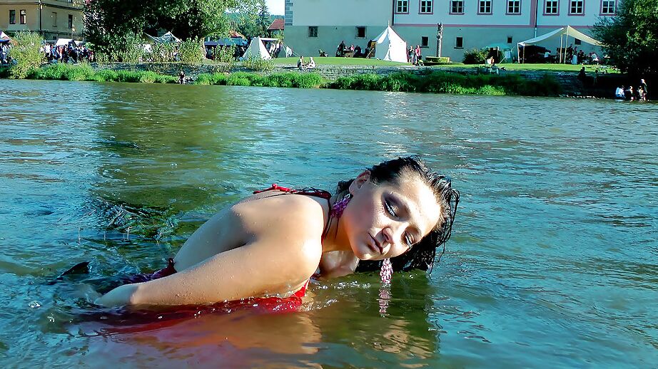 16P Seductive fetish babe Gina Killmer getting her clothes wet in public place