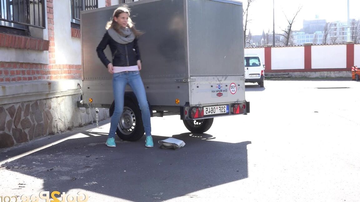 15P Sarah Key can't hold her pee any longer and pisses behind a trailer