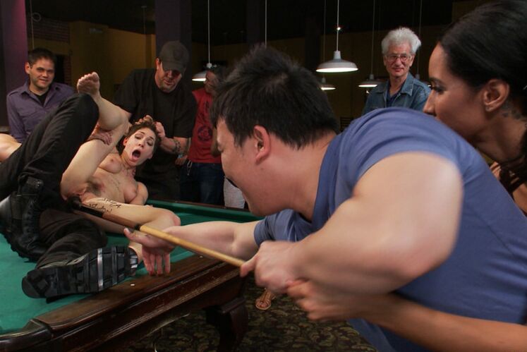 15P Naked brunette is restrained and penetrated inside a billiard club