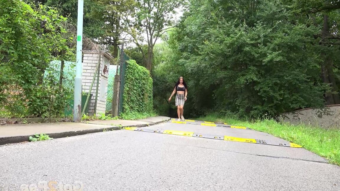 15P Solo girl Isabel Dark lets loose with a stream pf piss on a public sidewalk