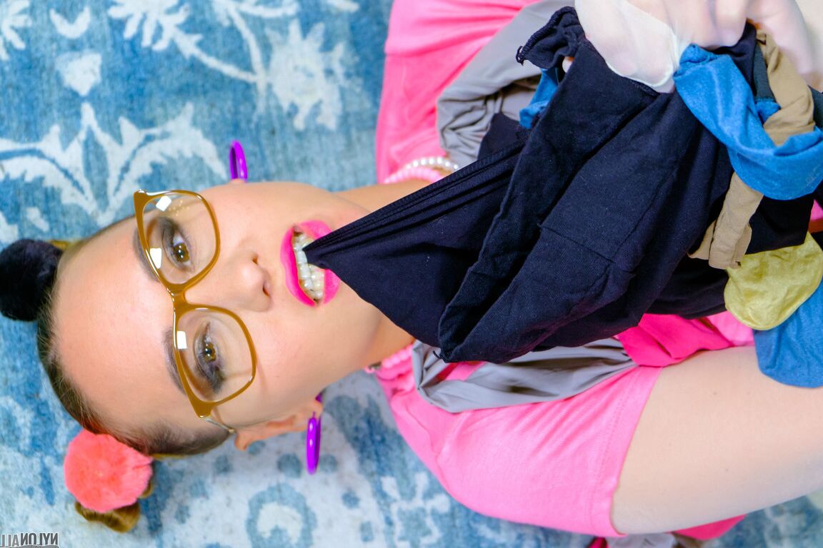 16P Cute girl Naomi adorns herself in layers of nylons during SFW solo action