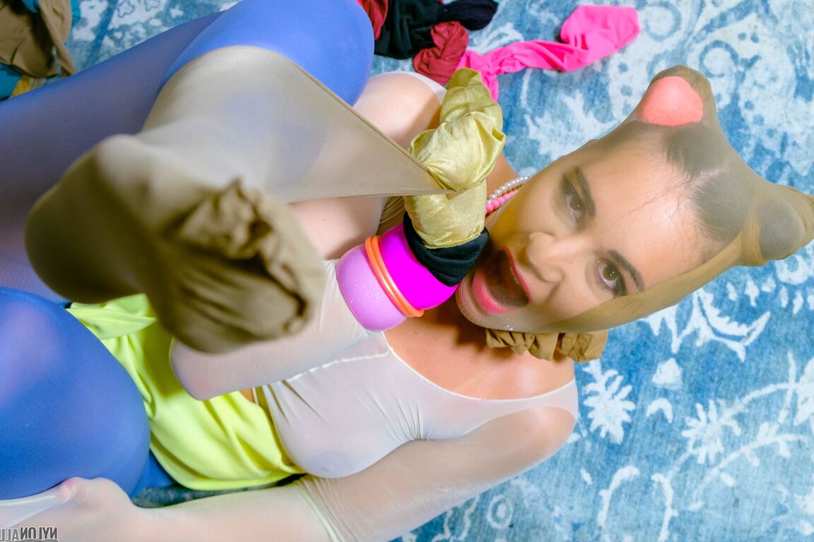 16P Cute girl Naomi adorns herself in layers of nylons during SFW solo action