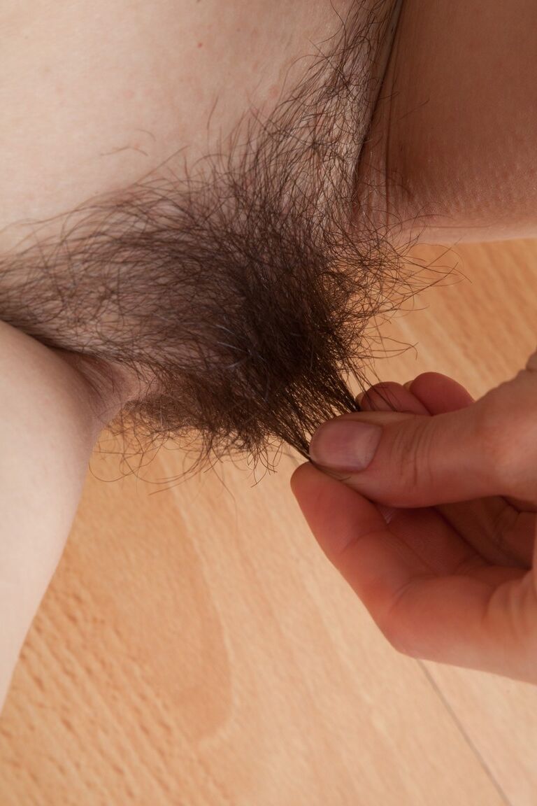 21P Hot brunette Rose Nore giving inviting up-close views of her spread hairy cunt
