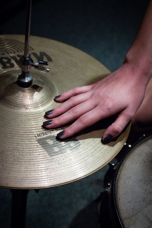 16P Sexy redhead Azura Starr gets naked while sitting at her drum kit