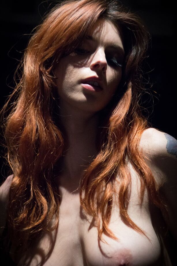 16P Sexy redhead Azura Starr gets naked while sitting at her drum kit