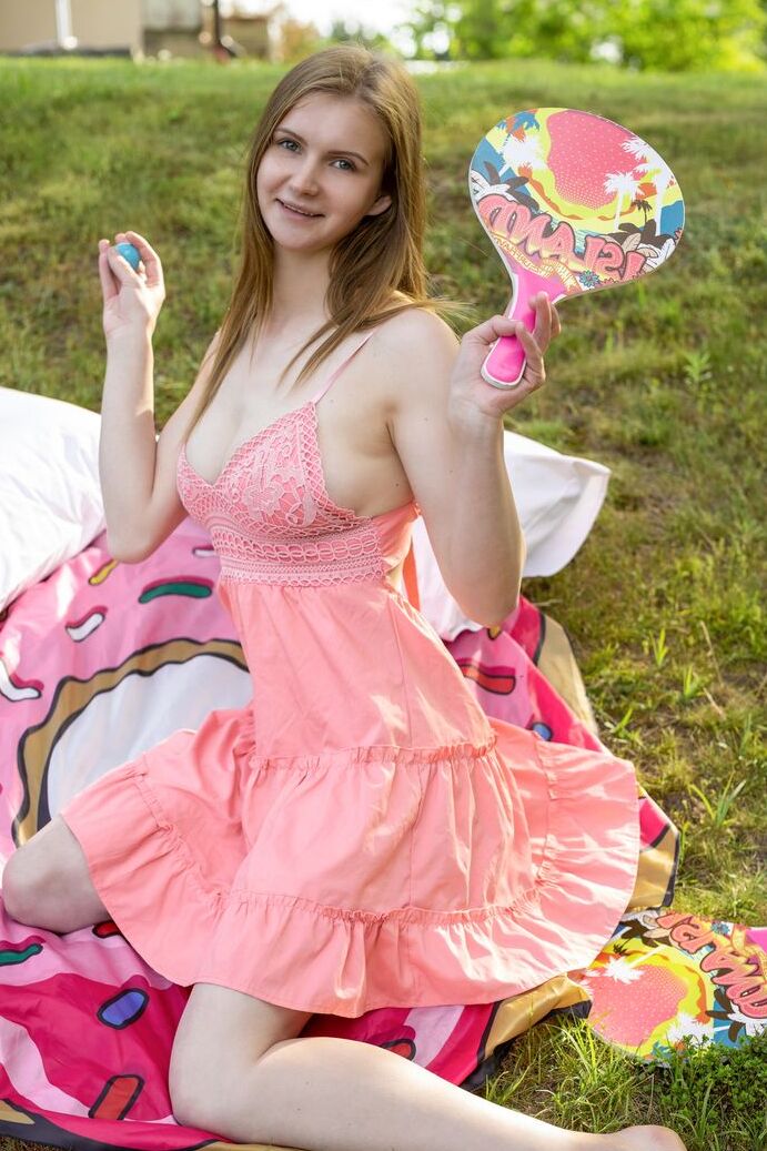 20P Teen amateur Kori puts her full breasts and bald twat on display upon a slope