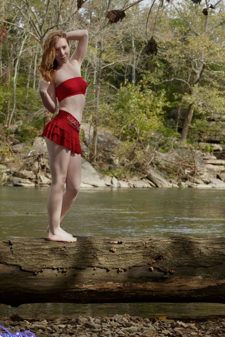 21P Amateur ginger Nicki Blue flashes her hard nipples and tiny tits by the river