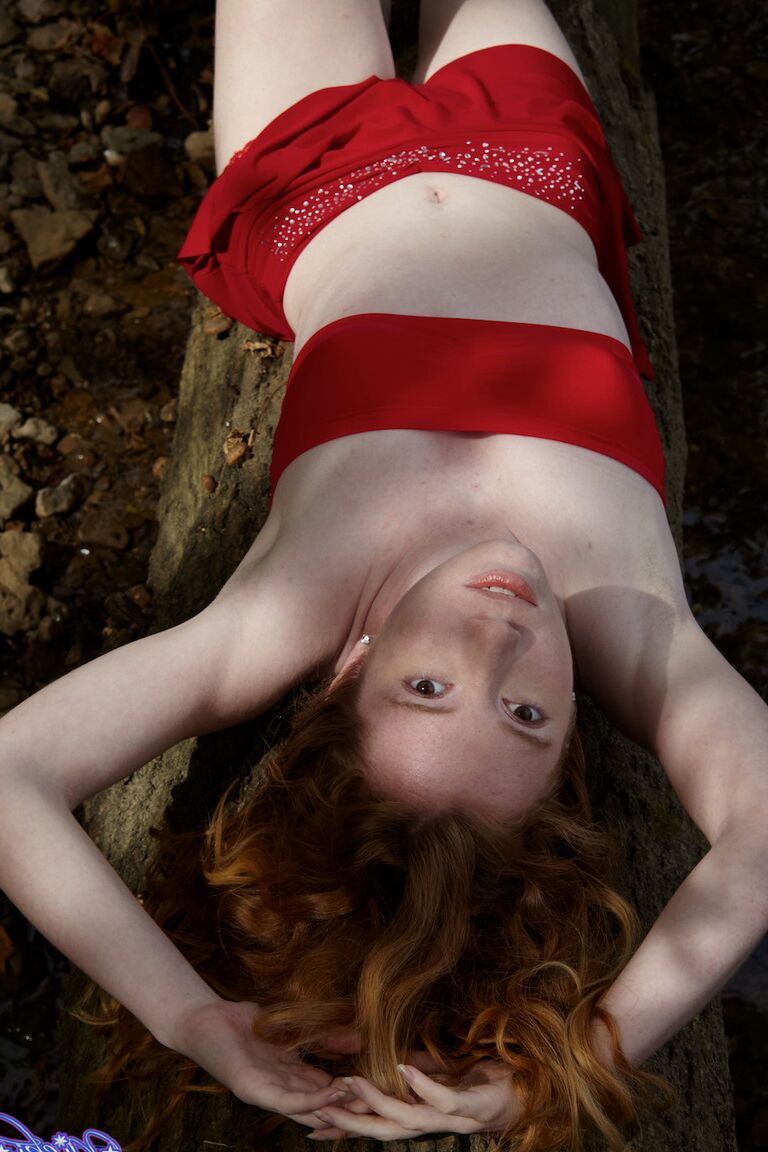 21P Amateur ginger Nicki Blue flashes her hard nipples and tiny tits by the river