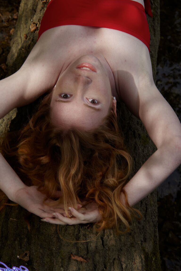 21P Amateur ginger Nicki Blue flashes her hard nipples and tiny tits by the river