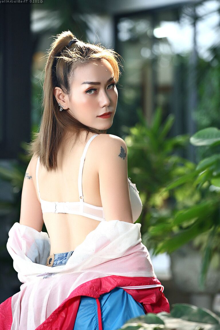 16P Hot Asian girl Yuri gets naked in a garden while wearing running shoes