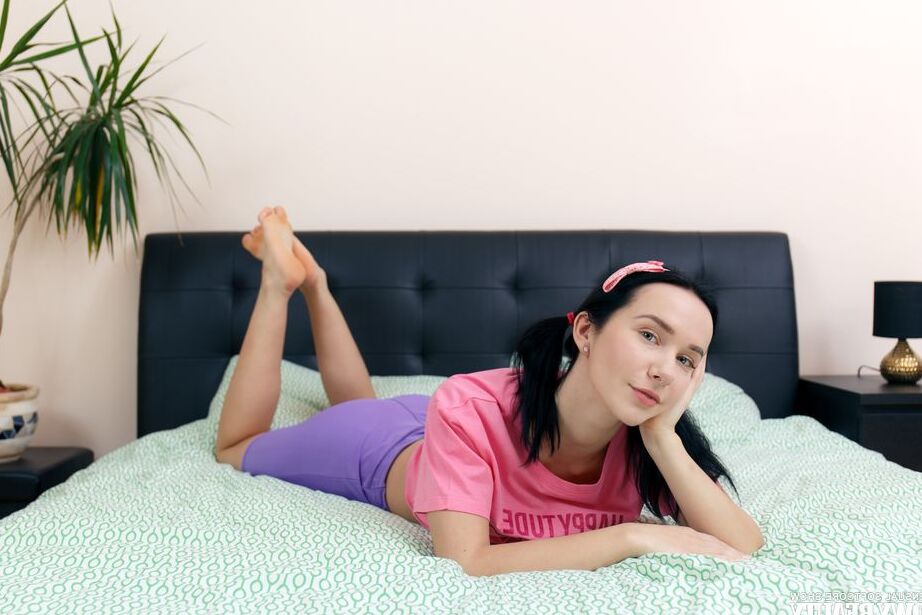 20P Breathtaking black haired babe playing in yoga outfit and stripping while