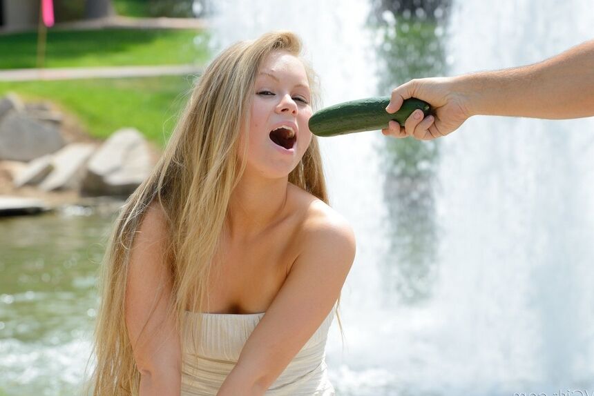 16P Blond teen inserts a cucumber in her twat after getting naked while walking