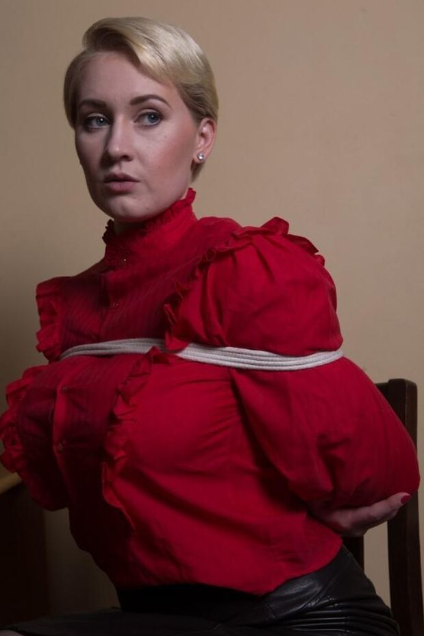 16P Short haired female loses her heels while tied up in leather skirt and hose