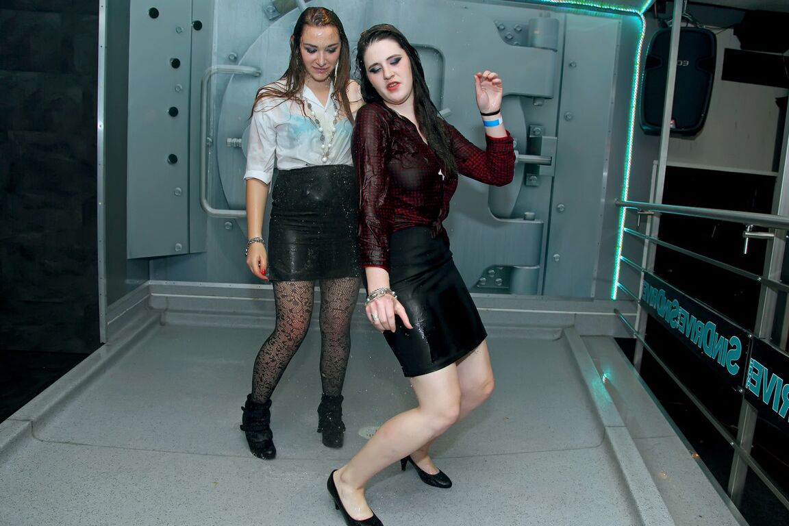 15P Clothed dancing girls get soaking wet when the sprinkler system malfunctions