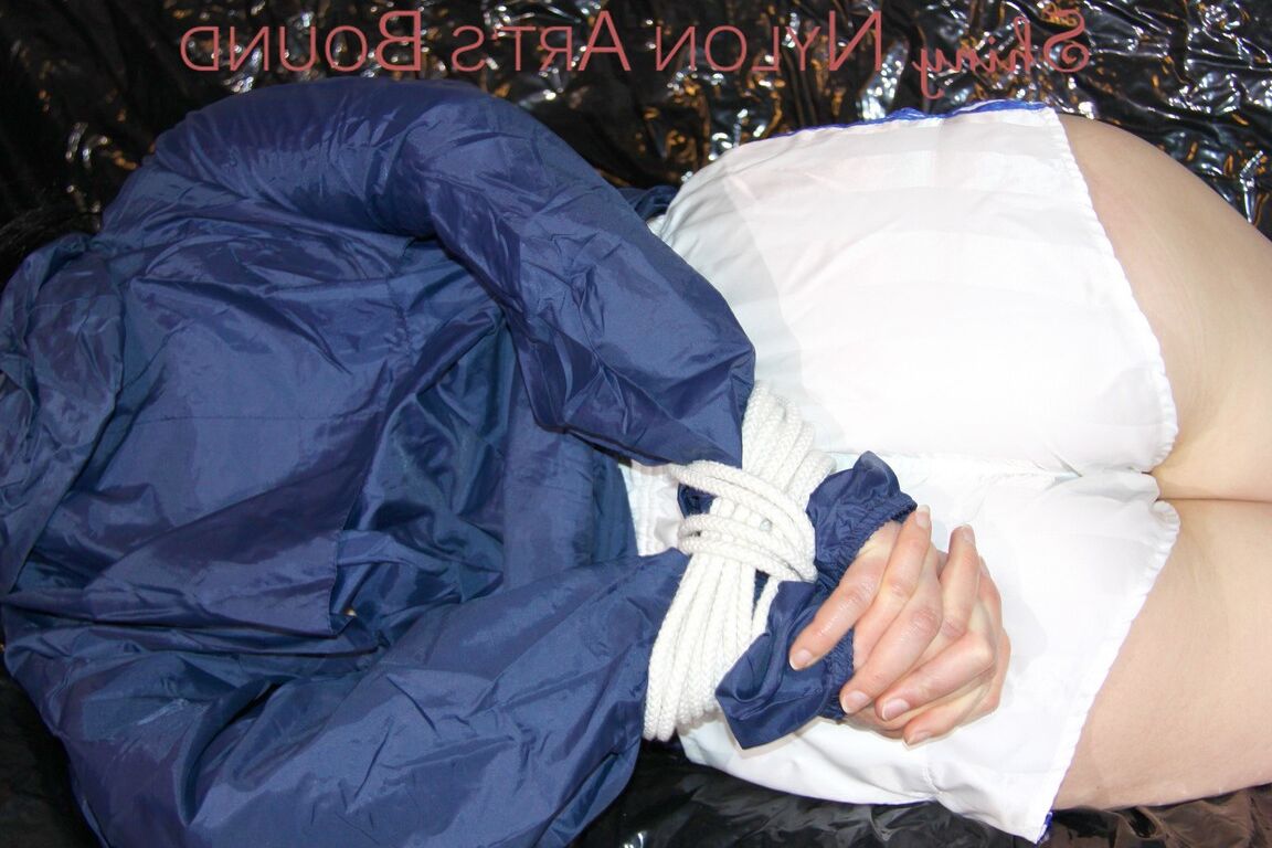 16P LUCY tied and gagged with ropes and a cloth gag wearing a supersexy white