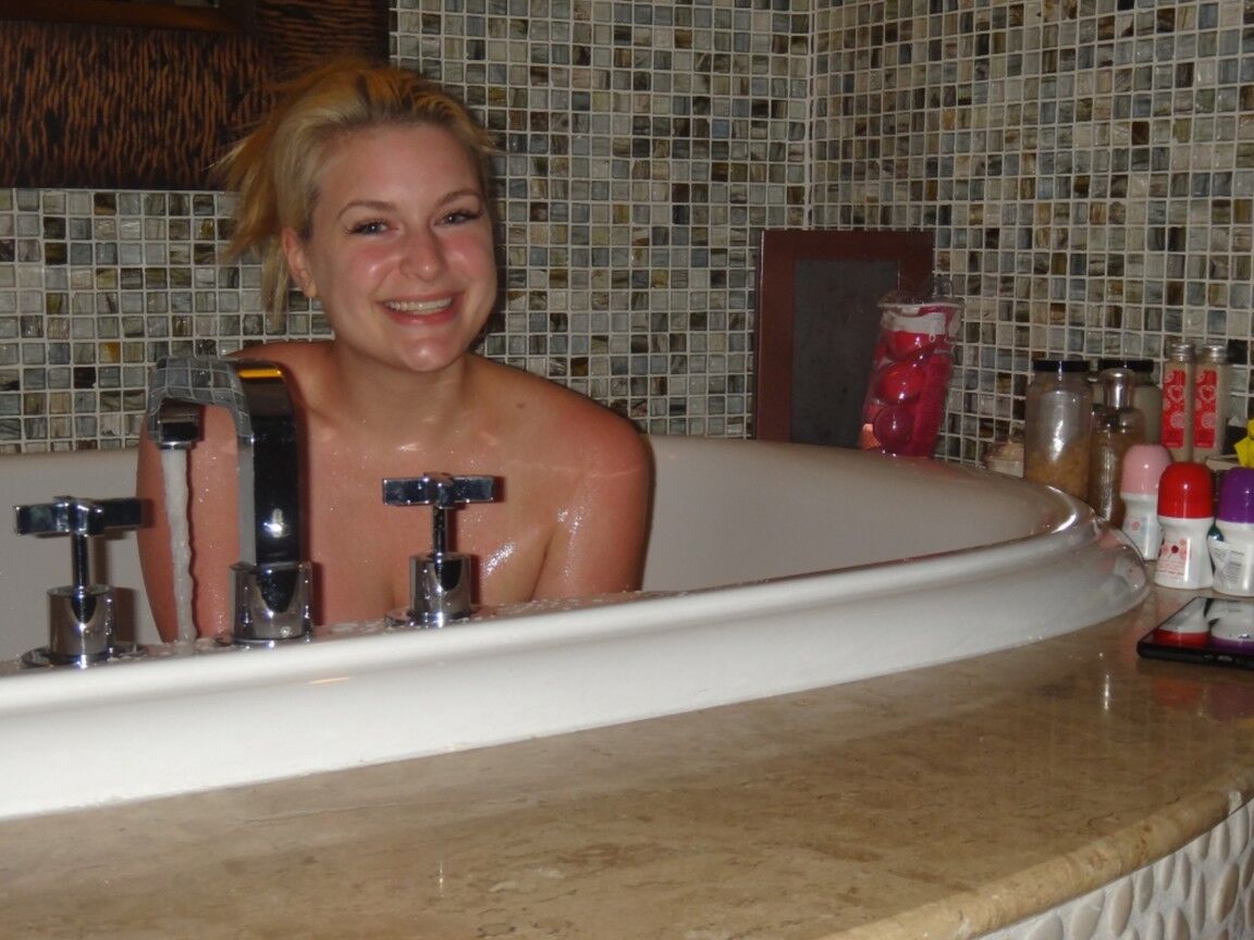 15P Thick blonde Danielle bares her big ass and trimmed twat in candid action