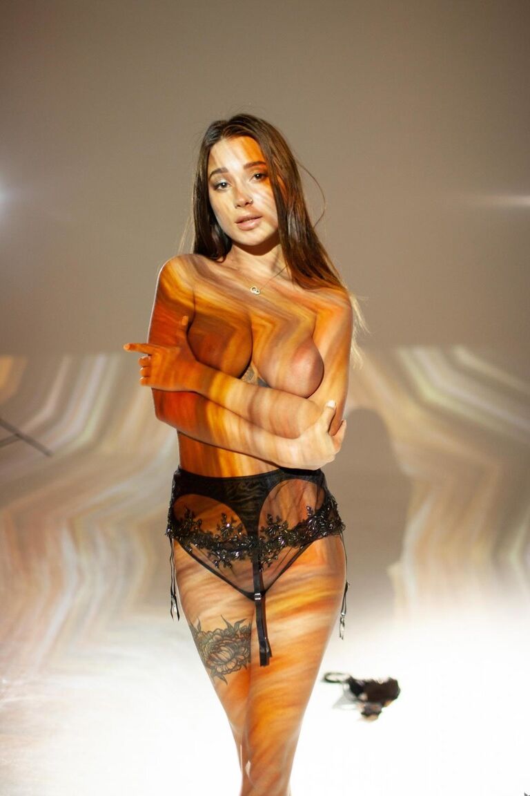15P Beautiful tattooed Medina poses with natural big tits in psychedelic splendor