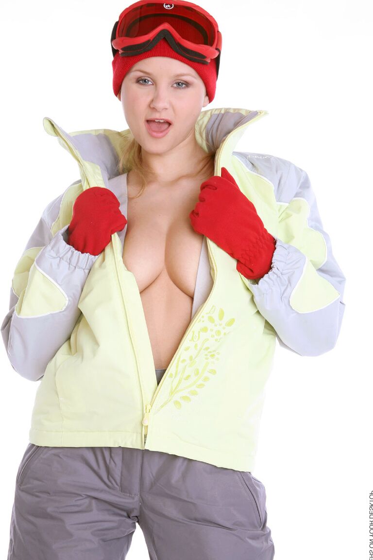 15P Snowboarder Lucianna hangs tight to her board while baring her great body