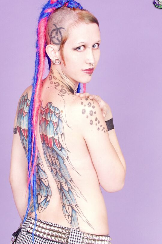 16P Tattooed girl Jax sticks her tongue out after stripping to her goth boots