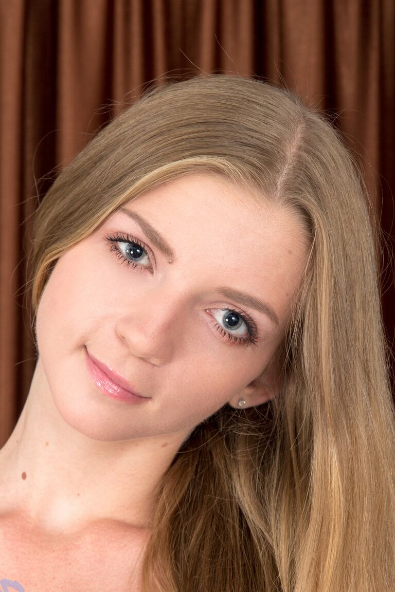 21P Teen with small boobs Flavia exposes her twat and sticks her fingers in it