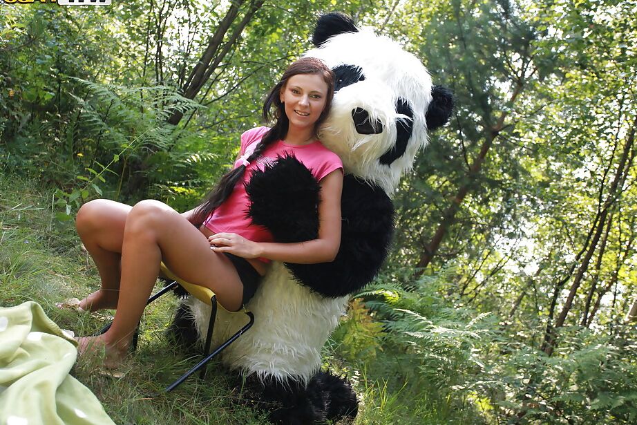 16P Naughty teen cutie with svelte body have some fun with a panda toy outdoor