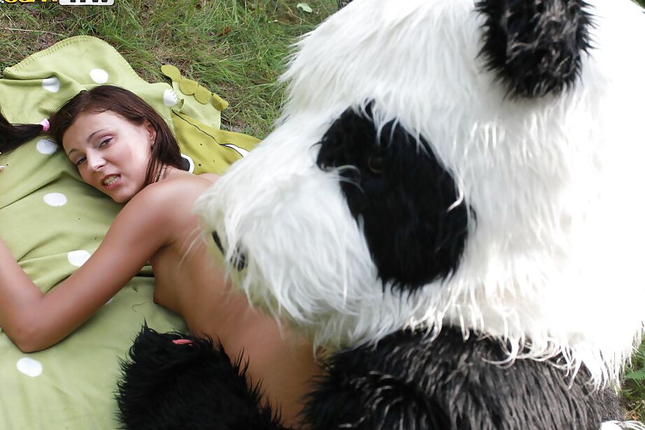 16P Naughty teen cutie with svelte body have some fun with a panda toy outdoor