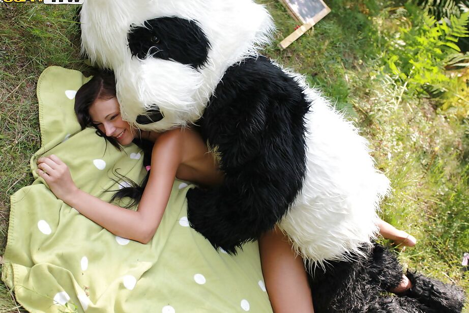 16P Naughty teen cutie with svelte body have some fun with a panda toy outdoor