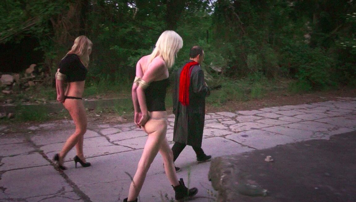 21P Sex slaves giving their BDSM handler a double blowjob after a whipping