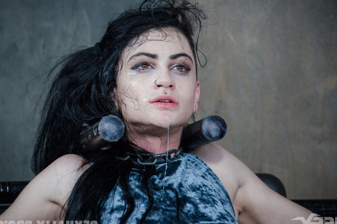 15P Dark haired chick Lydia Black endures facial abuse while restrained in dungeon