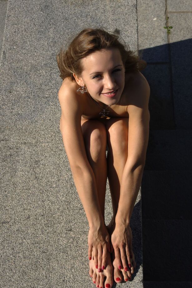 12P Slender teen strikes great nude poses on a harbour dock in a big city