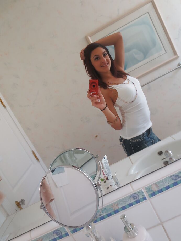 16P Nasty brunette slut Nikka taking couple of selfies in the bathroom