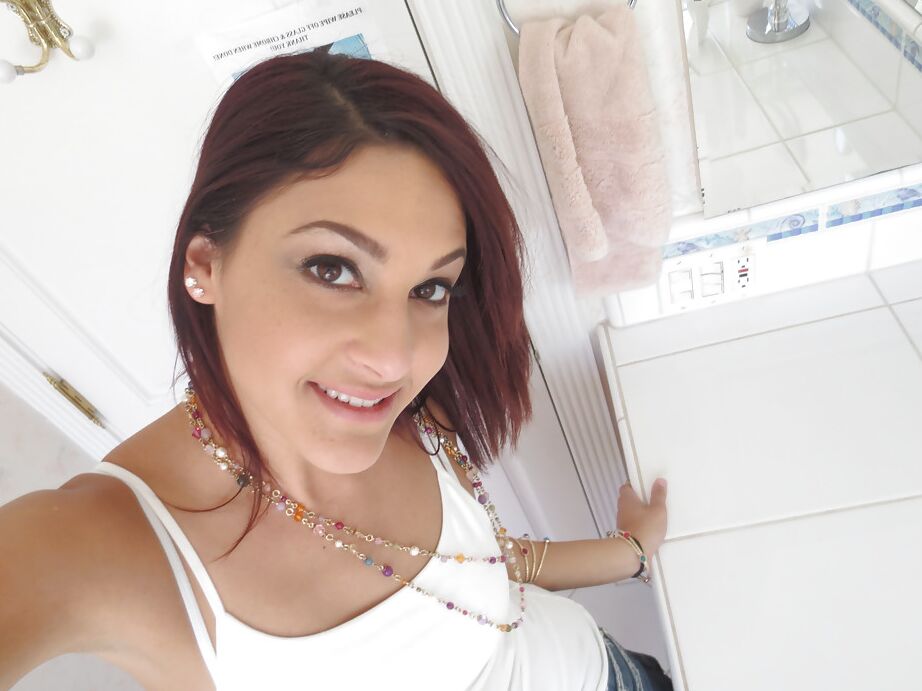 16P Nasty brunette slut Nikka taking couple of selfies in the bathroom