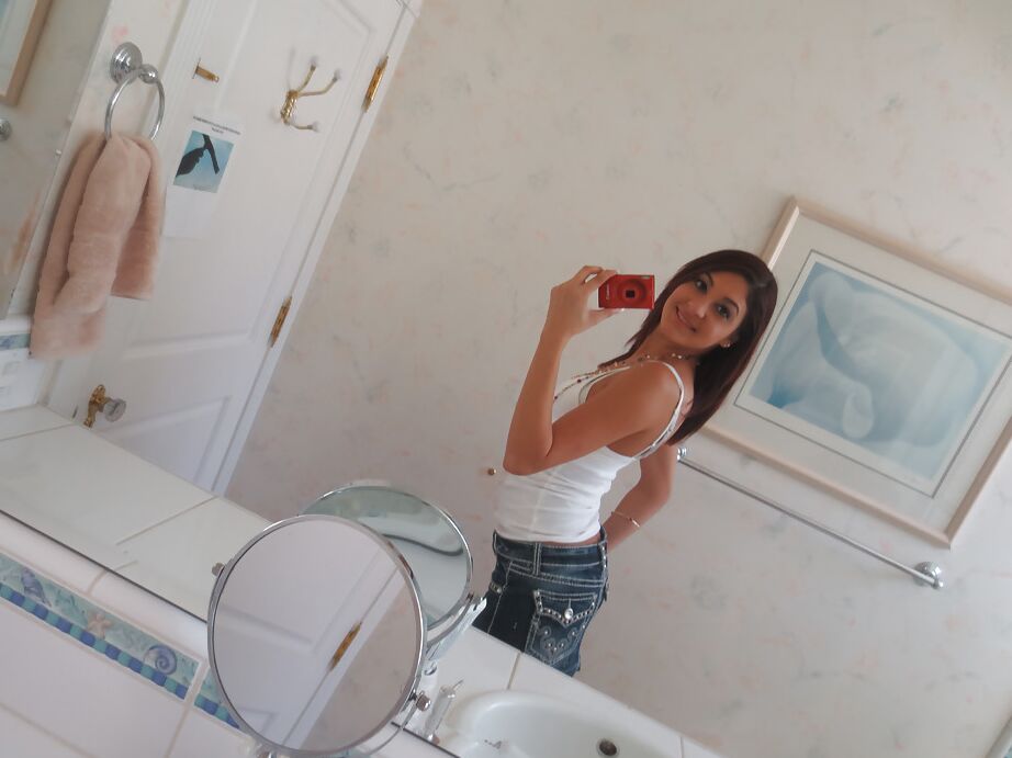 16P Nasty brunette slut Nikka taking couple of selfies in the bathroom