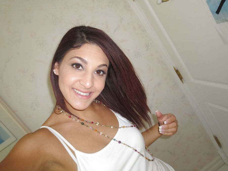 16P Nasty brunette slut Nikka taking couple of selfies in the bathroom